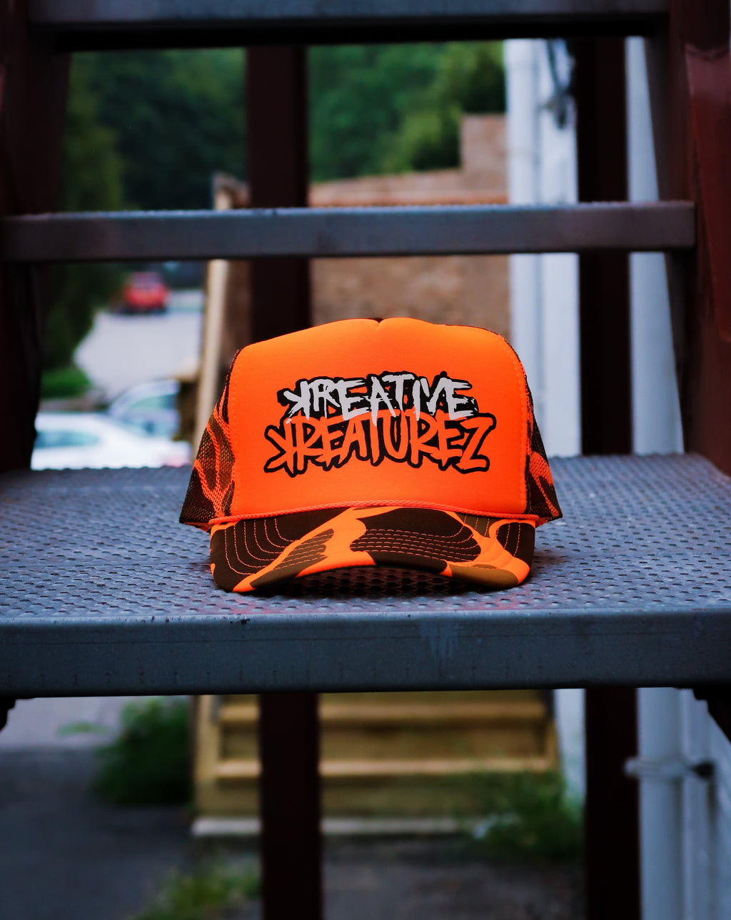 KREATIVE KREATUREZ TRUCKER HAT - ORANGE CAMO